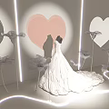 White Wedding Dress Display With Heart Shapes And Flowers