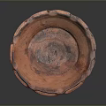 Red Bowl Shaped Sculpture With Irregular Edges And Textured Surface On Base