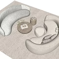 Modern Curved Light Sofa and Round Coffee Table Set with Decor Items on Textured Rug