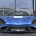 Blue McLaren Open Top Convertible Sports Car With Streamlined Body And Black Wheels