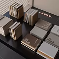 Stacked Books Magazines With Beige Brown Gray Covers Neatly Arranged On Table