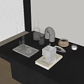 Modern Black Tabletop Display With Decorative Objects And Office Supplies