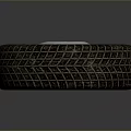 3D Rendered Tire With Black Tread Patterns Silver Rim And Central Hole On Gray Background