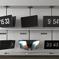Hanging Multiple Televisions with Time Displays and Scenery Images on Screens
