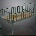 Green Metal Frame Bed With Brown Mattress And Safety Rails