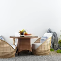 Natural Wicker Outdoor Sofa With Round Table And Green Plants In Garden