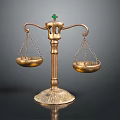 Golden Balance Scales with Green Gemstone on Top and Decorative Metallic Base Against Dark Background