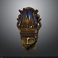 Intricate Golden Head Sculpture With Crown Like Structure And Blue Snake Ornaments