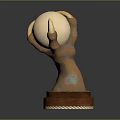 Hand Sculpture With Bronze Texture Holding Light Colored Egg On Brown Base