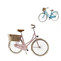 Stylish Pink And Blue Bicycles With Wicker Baskets For Casual Rides