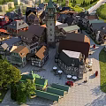 Aerial View Town Planning With Traditional Buildings Central Plaza Various Rooftops Green Spaces And Tower