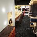 Traditional Japanese Restaurant Interior With Sushi Bar Seating Area And Decorative Elements