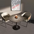 Two Modern Lounge Chairs With Round Black Table Orange Decor And 1951 Poster