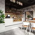 Modern Café Interior With Wooden Dining Tables White Chairs Pendant Lights And Green Plant