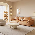 Beige Sofa and White Round Coffee Table Set with Orange Cushions in Warm Living Room