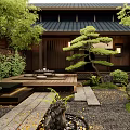 Traditional Japanese Courtyard Garden With Wooden House Stone Pathway And Pine Tree