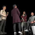 Group of Diverse People Interacting in Casual Setting With Wheelchair User
