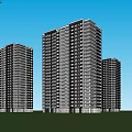 High Rise Residential Buildings With Green Trees Lawn And People Relaxing Under Blue Sky