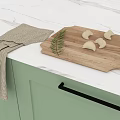 Fresh Dumplings on Wooden Cutting Board with Decorative Leaf and Checkered Cloth in Kitchen