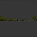 Decorative Green Stones in Various Sizes Arranged in a Curved Line