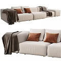 Comfortable Cream Three Seater Sofa With Brown Cushions And Throw Blanket 3d model