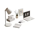 Stylish Desk Setup With Lamp Rhino Figurine Plant Frame Laptop And Books
