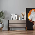 Stylish Console Table With Palm Plant Picture Frames And Dried Floral On Wooden Floor