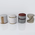 Four Unique Modern Ottoman Designs with Various Materials and Shapes