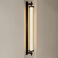 Modern Wall Lamp with Metal Frame and White Shade Mounted on Beige Wall