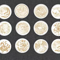 Twelve Round White Pendants Featuring Intricate Golden Dragon Patterns Displayed 3d model
