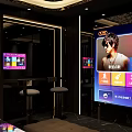 Luxurious KTV Interior With Leather Sofa Mirrored Walls And Decorative Ceiling Design