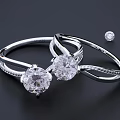 Sparkling Diamond Rings With Large Center Stones And Small Inlaid Gems On Silver Bands