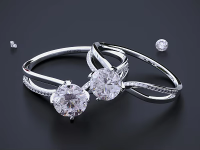 Sparkling Diamond Rings With Large Center Stones And Small Inlaid Gems On Silver Bands 3d model
