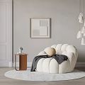 Modern White Sectional Sofa with Gray Wall Wooden Floor and Round Rug in Living Room