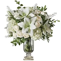 White Floral Arrangement With Lilies Roses Hydrangeas In Glass Vase And Green Leaves