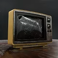 Vintage Television With Cracked Screen Yellow And Silver Casing Classic Design
