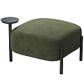 Round Green Upholstered Ottoman With Black Wooden Legs And Small Side Table