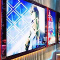 Modern KTV Interior Design With Neon Lights Large Screens And Comfortable Sofa