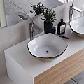 White Square Wash Basin With Black Rim Modern Faucet And Green Plant On White Countertop