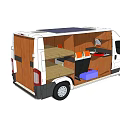 Camper Van With Solar Panels On Roof And Interior Kitchen Seating Living Space