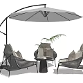 Comfortable Outdoor Chairs With Metal Frame And Fabric Cushions Under Large Umbrella And Side Table