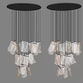 Modern Artistic Chandelier with Transparent Irregular Shapes and Warm Glow for Interior Decoration