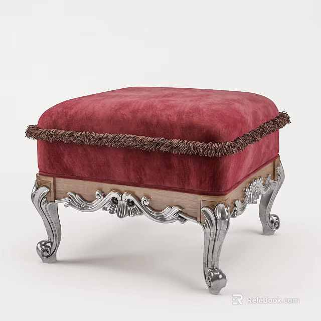 Elegant Red Ottoman With Fringed Trim And Ornate Silver Carved Legs 3d model 