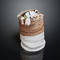 Woven Storage Basket With Brown And White Design Holding Decorative Fabric Items