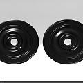 Two Black Circular Decorative Objects With Intricate Carvings And Smooth Edges Design 3d model