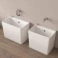 Wall Mounted White Square Washbasins With Silver Faucets On Light Colored Wall And Wooden Floor