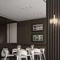 Modern Hotel Public Lounge With Dark Wooden Walls White Tables And Framed Paintings