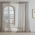 Gray Sheer Curtains Covering Arched Window in Bright Room with White Walls and Wooden Floor
