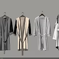 Various Colored Bathrobes Hanging On Wall As Soft Bathroom Accessories
