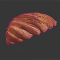 Freshly Baked Golden Brown Braided Bread With Shiny Surface On Dark Background